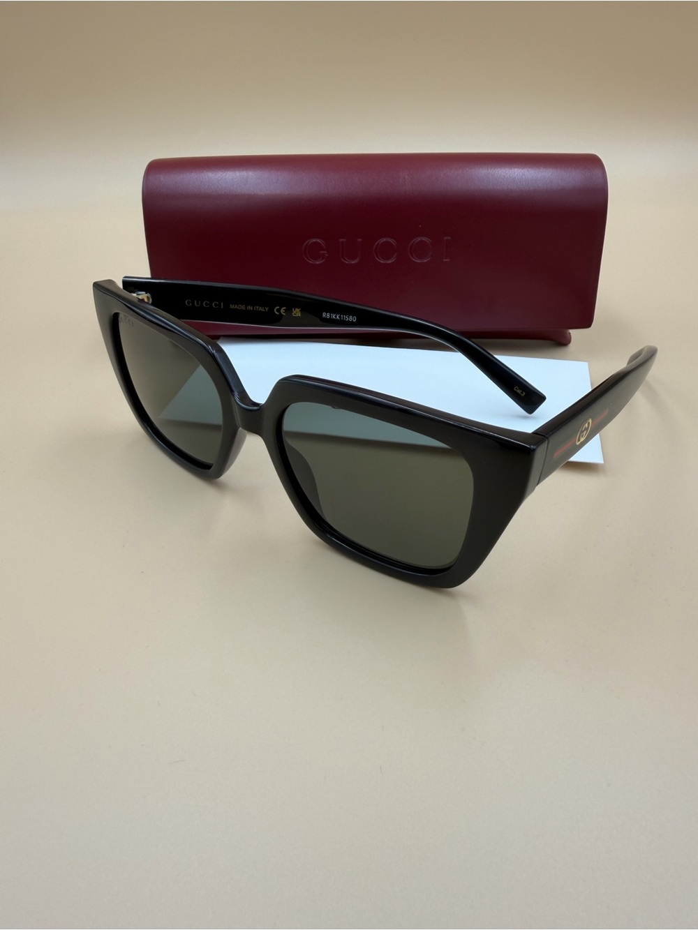 Gucci Black Cat-Eye Women's Sunglasses with Dark Green Lenses